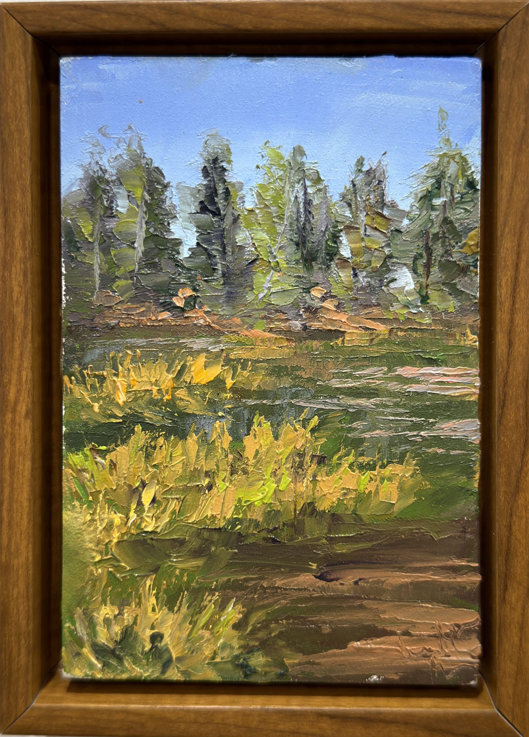 Framed plein air painting from Tioga Road in Yosemite National Park, with evergreen trees, golden foliage, and blue sky.